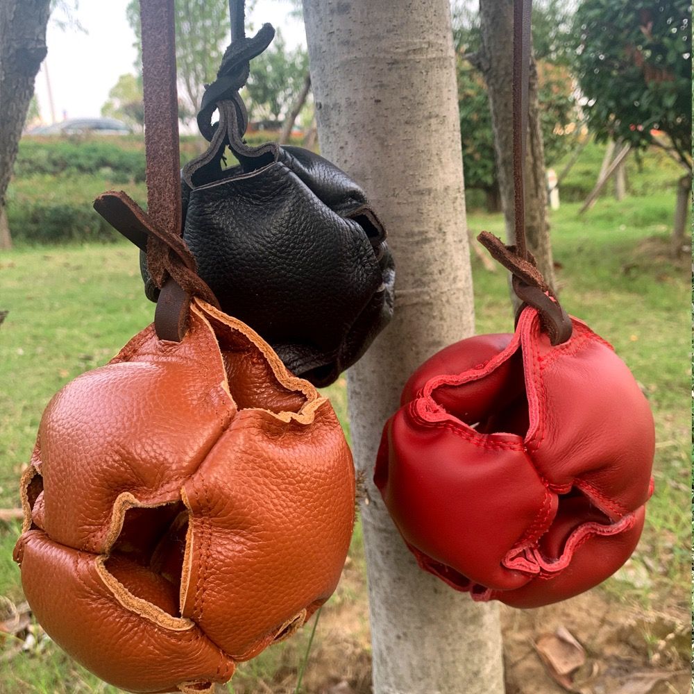 Interactive Leather Chew Ball for Dogs with Durable Rope Handle – Ideal for Puppy Training, Dental Chewing, Outdoor Fetch, and Bonding Play for Small to Medium Breeds (Black)
